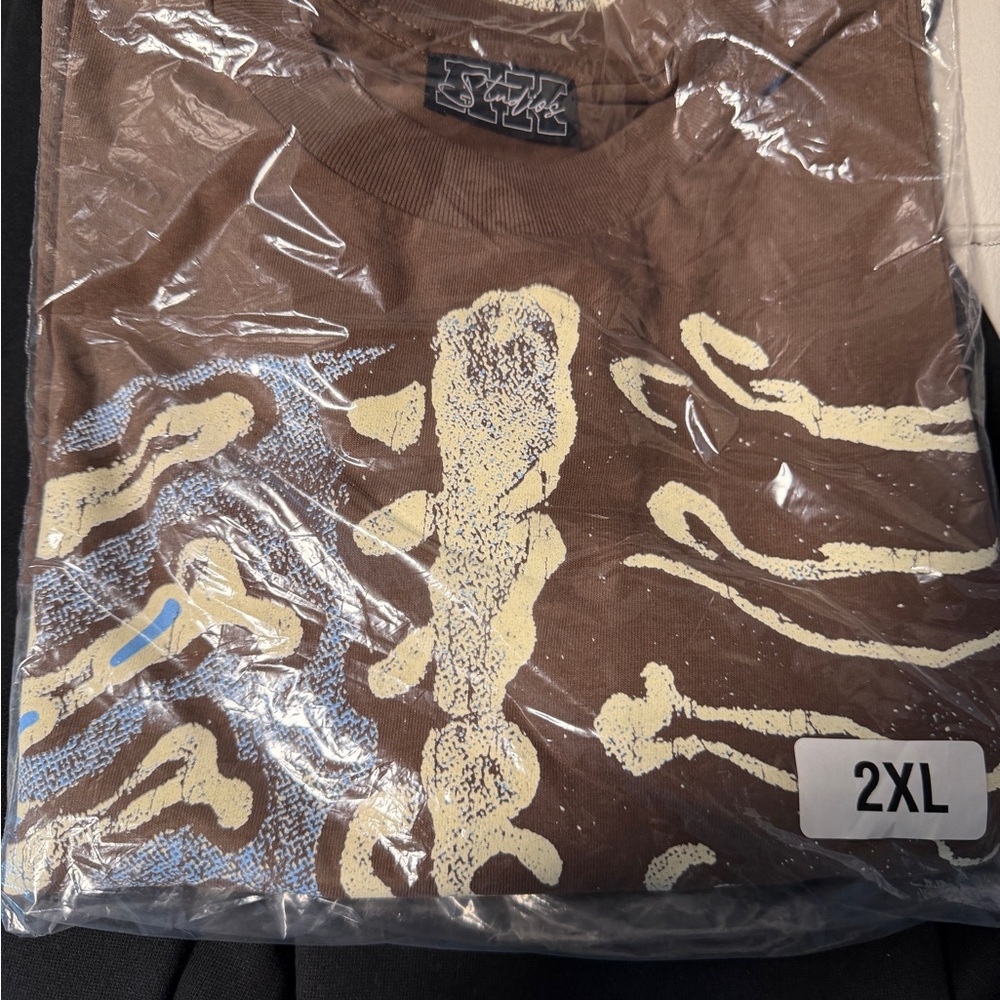 Cactus Jack by Travis Scott Brown Tee with Cream and Blue Design